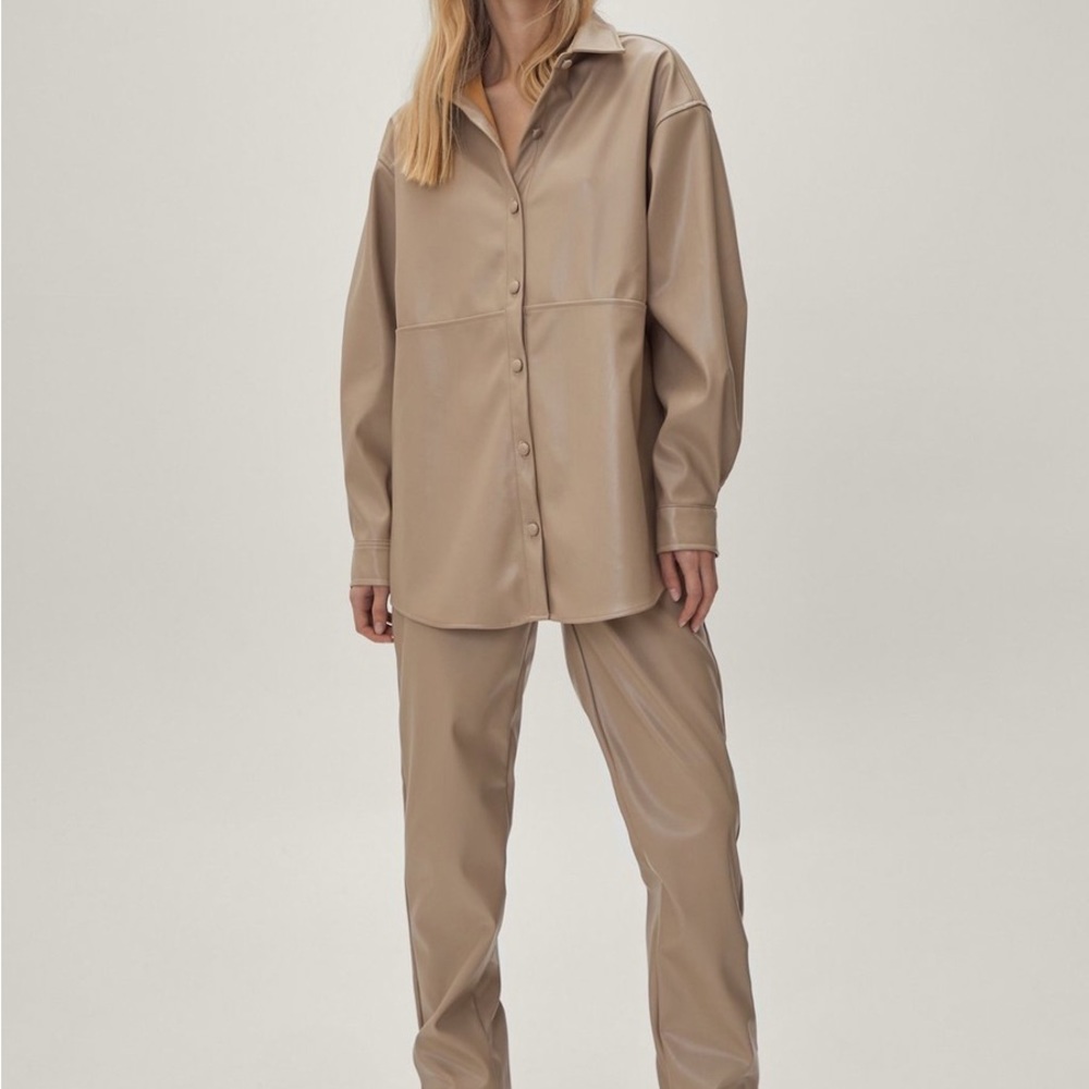 Two piece faux leather and features an oversized silhouette size 0 taupe color